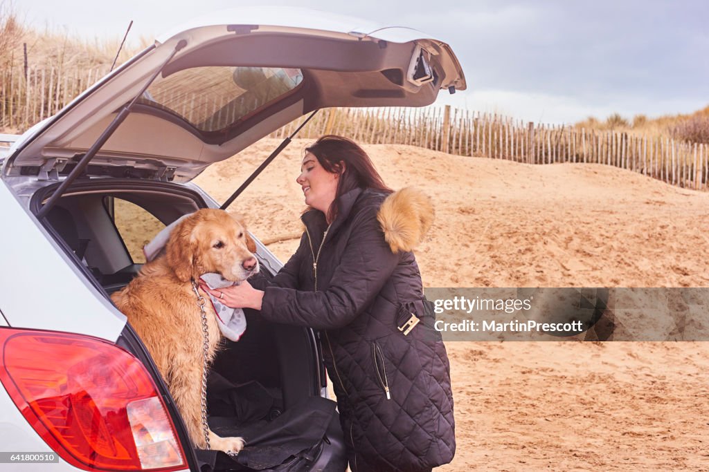 Drying the dog after his beach run