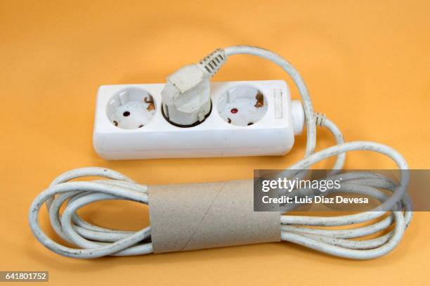 keep your cables tidy with a cardboard tube - power strip stock pictures, royalty-free photos & images