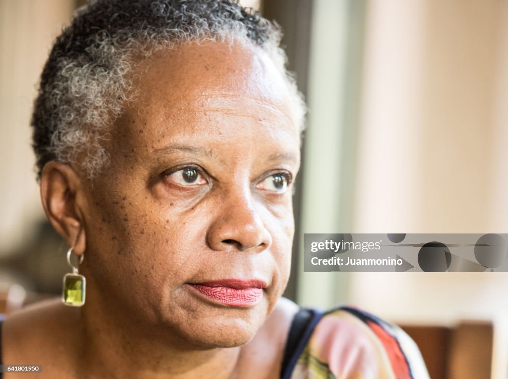 Sad senior african american woman