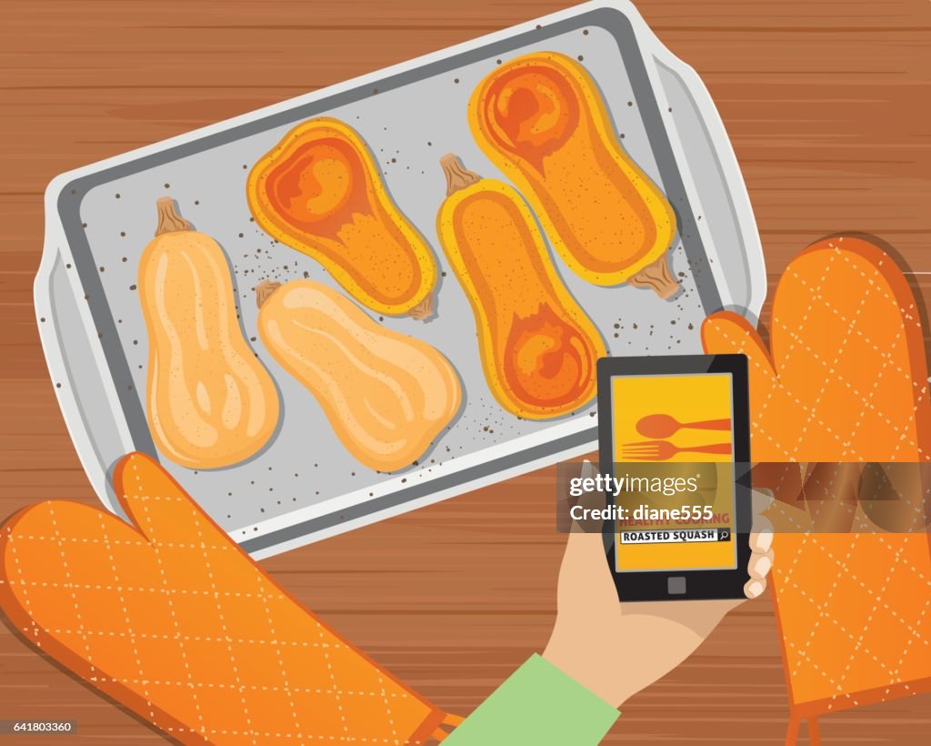 Overhead hoek van een persoon met behulp van Online Apps voor het koken