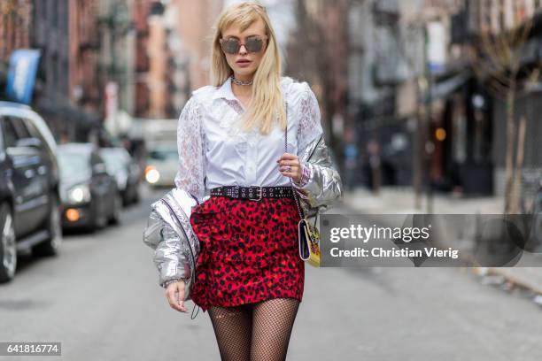 Bonnie Strange wearing a red Zara skirt, a silver Asos jacket, a white blouse Escada, black boots &other stories, Jimm Choo bag, net nights, Guess...