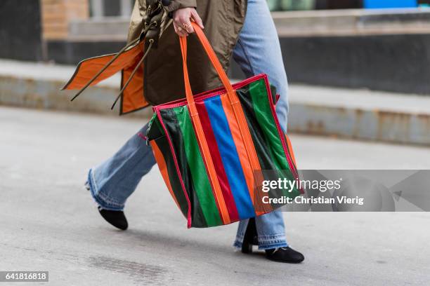 Annabel Rosendahl wearing parka, denim jeans, Balenciaga bag outside Proenza Schouler on February 13, 2017 in New York City.