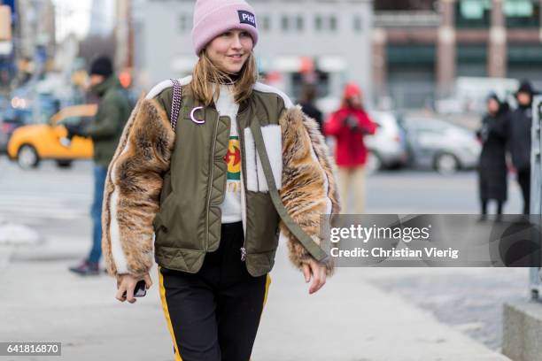 Jessica Minkoff wearing a bomber jacket with fur sleeves, jogger pants outside 3.1 Phillip Lim on February 13, 2017 in New York City.