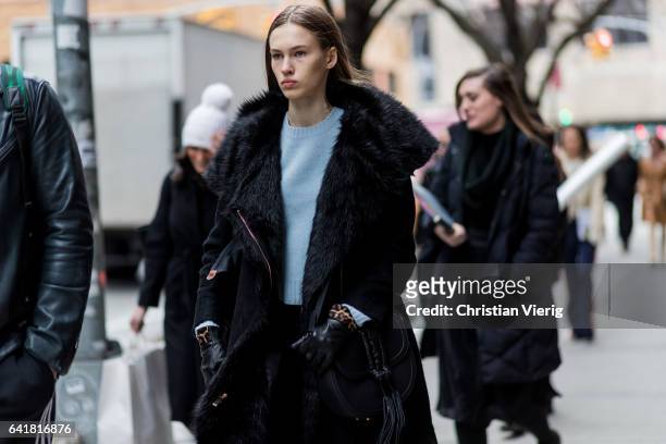 Model wearing a inner lining jacket, Chloe bag outside Proenza Schouler on February 13, 2017 in New York City.