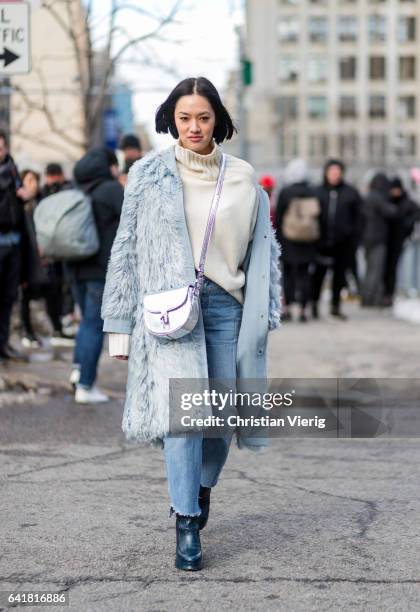 Tiffany Hsu wearing a fur coat outside 3.1 Phillip Lim on February 13, 2017 in New York City.