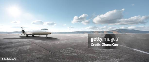 private aircraft parked on the tarmac - runway foto e immagini stock