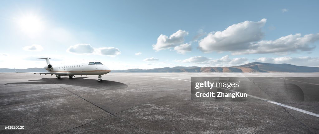 Private aircraft parked on the tarmac