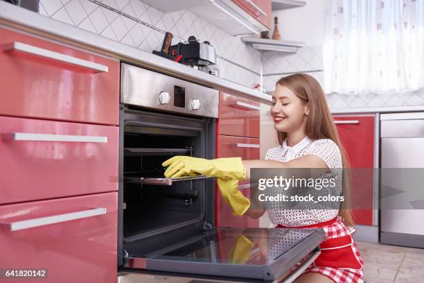 cleaning the kitchen and the stove - dirty oven stock pictures, royalty-free photos & images