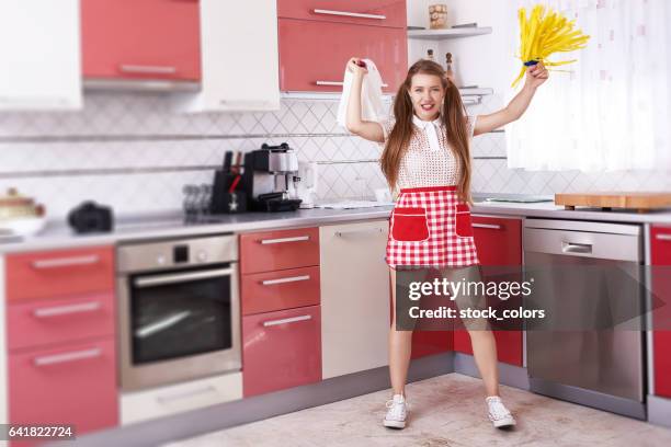 energy while cleaning the kitchen - dance routine stock pictures, royalty-free photos & images