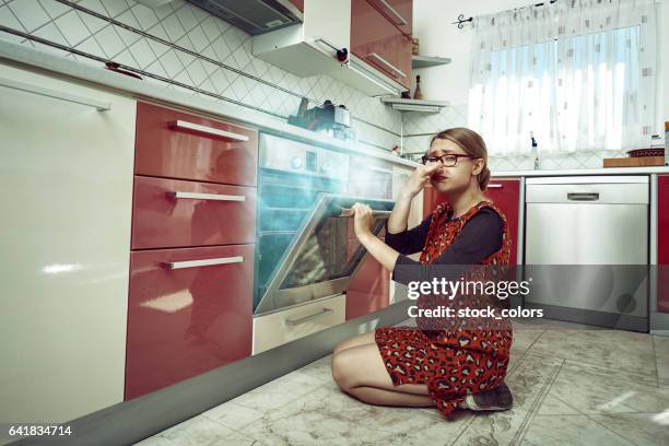 something went wrong with my food - poor kitchen stock pictures, royalty-free photos & images