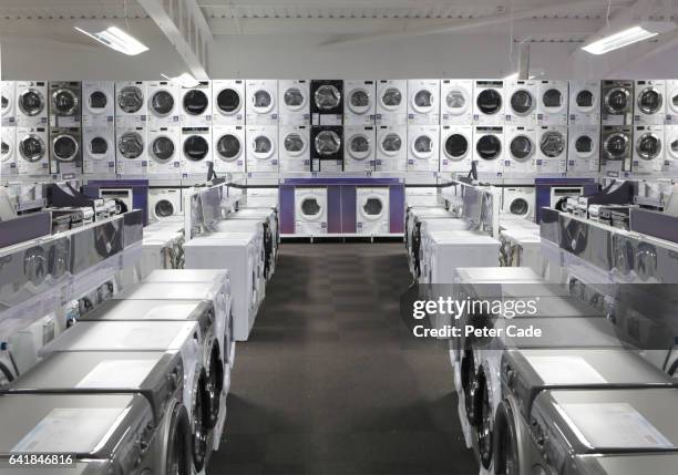 white goods in electrical shop - negozio di elettrodomestici foto e immagini stock