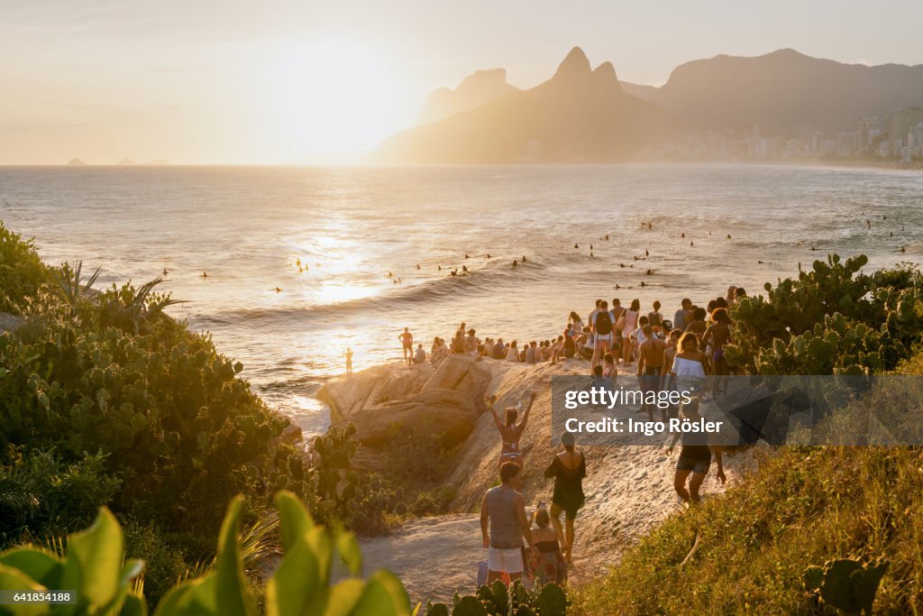 Crowd enjoying sunset