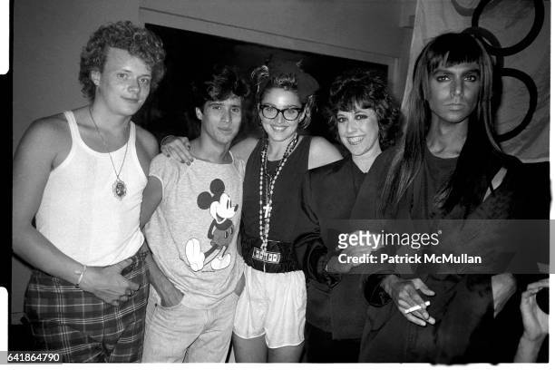 Martin Burgoyne, John 'Jellybean' Benitez, Madonna, Lisa Robinson, and Steven Meisel at David Lee Roth's birthday party held at Area. 1984.