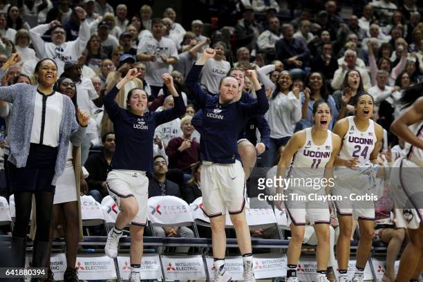 The UConn bench including Tierney Lawlor, Molly Bent, Kyla Irwin, Kia Nurse and Napheesa Collier of the Connecticut Huskies erupts as they celebrate...