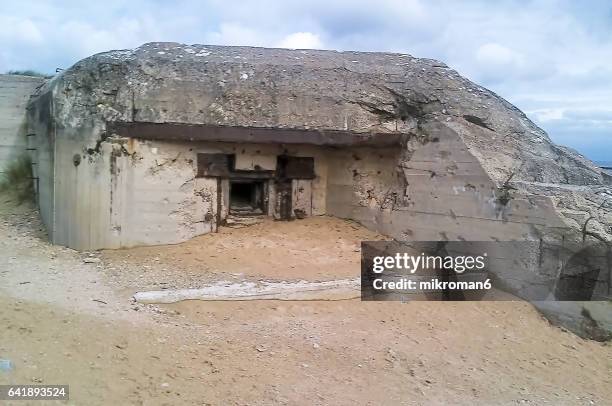 exterior of bunker in normandy, france - pillbox hat stock pictures, royalty-free photos & images