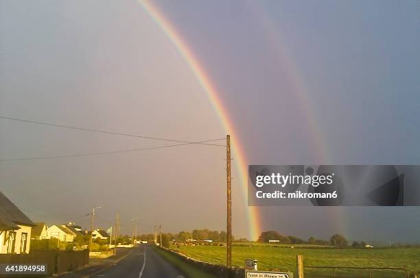 double rainbow landscape in beautiful  irish landscape scenery.co tipperary ireland. - lumen field fotografías e imágenes de stock