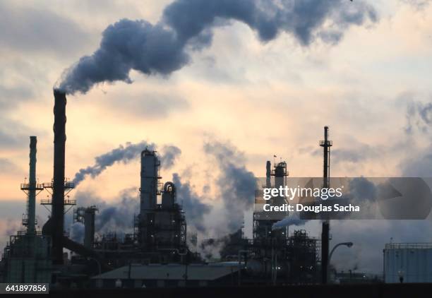 environmental air pollution dumping into the sky above - emphysema stock pictures, royalty-free photos & images