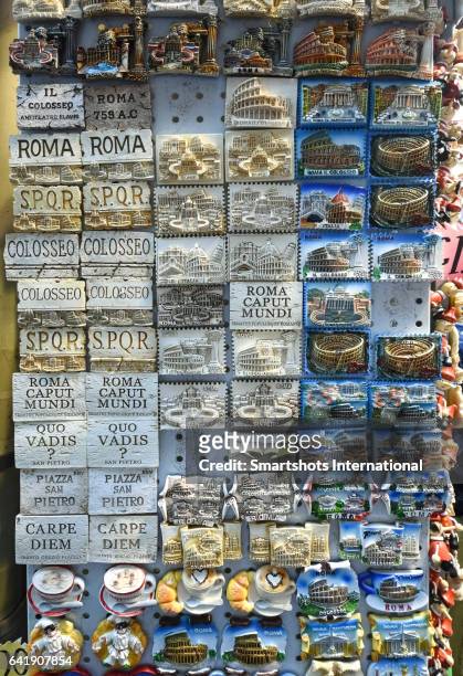 souvenir magnets of rome main landmarks for sale in a local flea market in rome, italy - roma capucino stock pictures, royalty-free photos & images