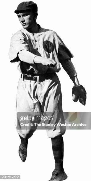 Rabbit Maranville, shortstop and second baseman of the Boston Braves throws the baseball, circa 1915.