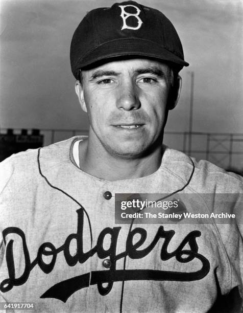 Pee Wee Reese, shortstop and third baseman of the Brooklyn Dodgers, poses for a portrait, circa 1940.