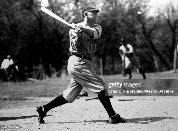 Ty Cobb of Detroit Tigers taking a swing during spring training, on March 16, 1921.