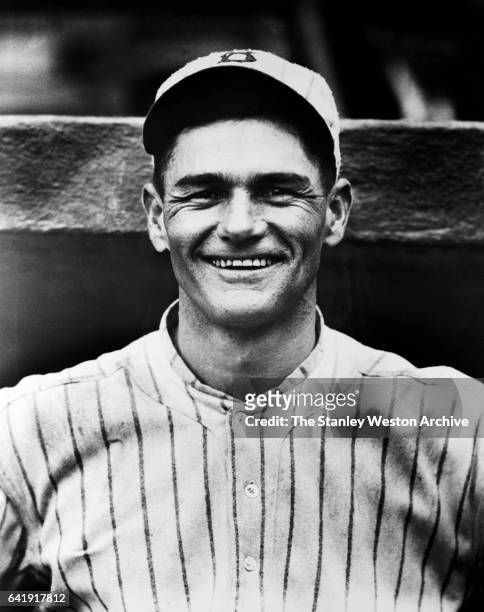 Zack Wheat, left fielder of the Brooklyn Dodgers poses for a portrait, circa 1920.