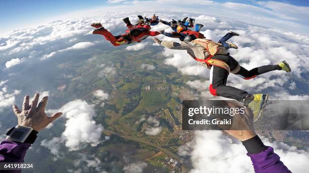 skydiving pov at the summer day - skydiving pov stock pictures, royalty-free photos & images