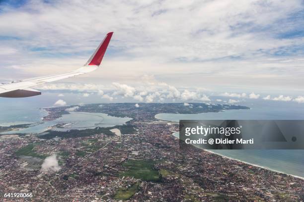 aerial view of the south part of the island of bali in indonesia - bali airport ストックフォトと画像
