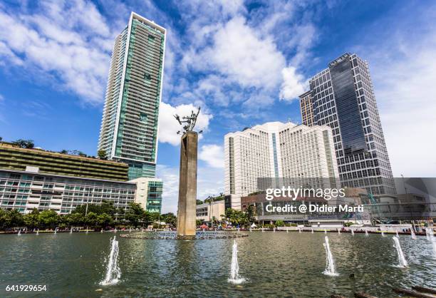 modern jakarta skyline in indonesia capital city - indonesia cityscape stockfoto's en -beelden