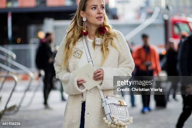Leonie Sophie Hanne wearing a Chloe bag outside Tory Burch on February 14, 2017 in New York City.