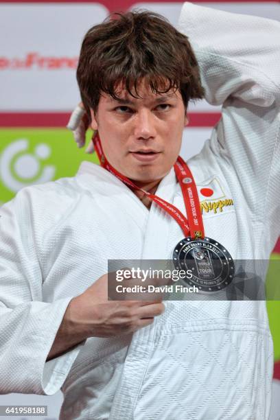 Over 100kg silver medallist and twice World silver medallist, Ryu Shichinohe of Japan, adjusts his medal strap during the 2017 Paris Grand Slam at...