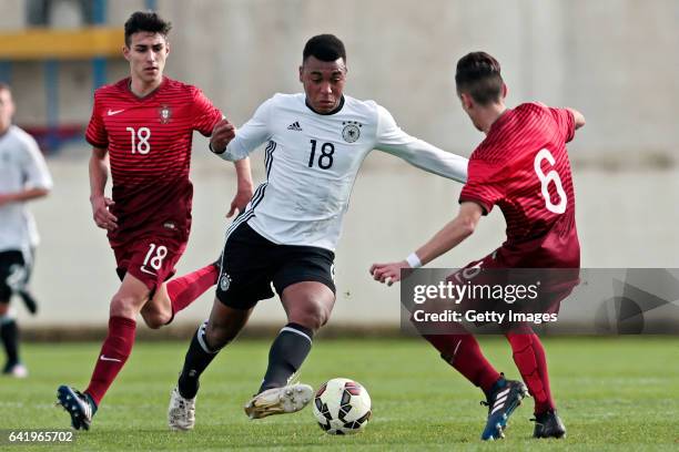 Maurice Malone of Germany U17 challenges André Almeida and Afonso Sousa of Portugal U17 during the U17 Algarve Cup Tournament Match between Portugal...