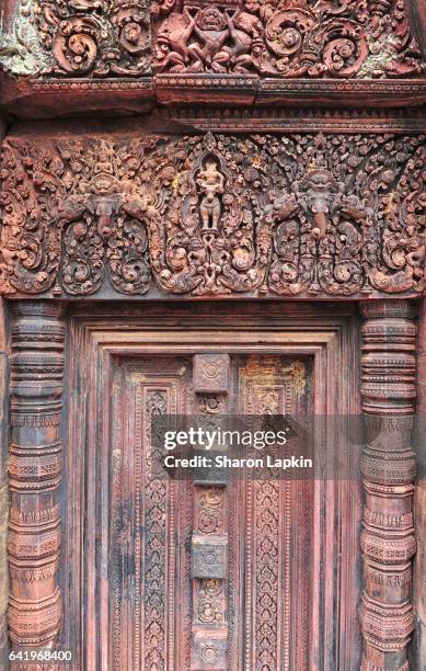 intricately carved doorway at banteay srei temple - angkor stock pictures, royalty-free photos & images