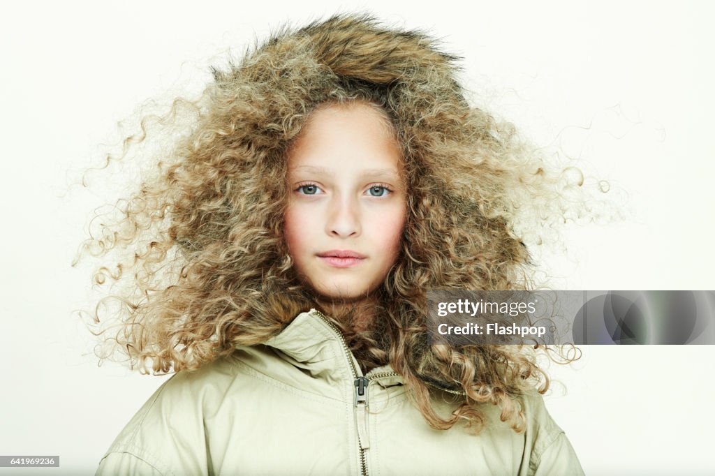 Portrait of girl wearing winter coat