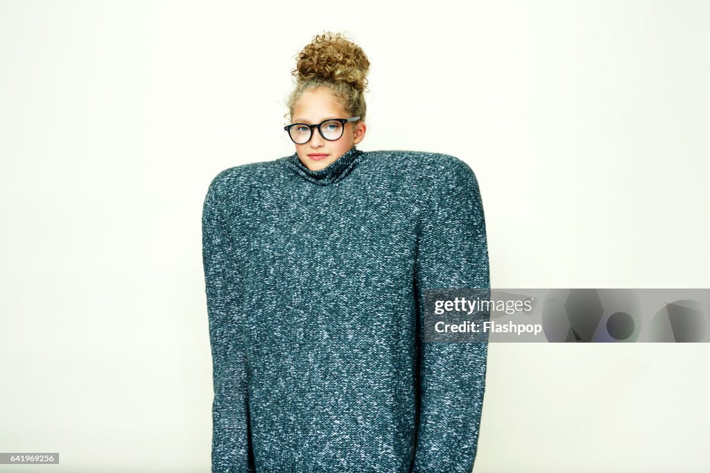 Portrait of girl with a small head and huge body