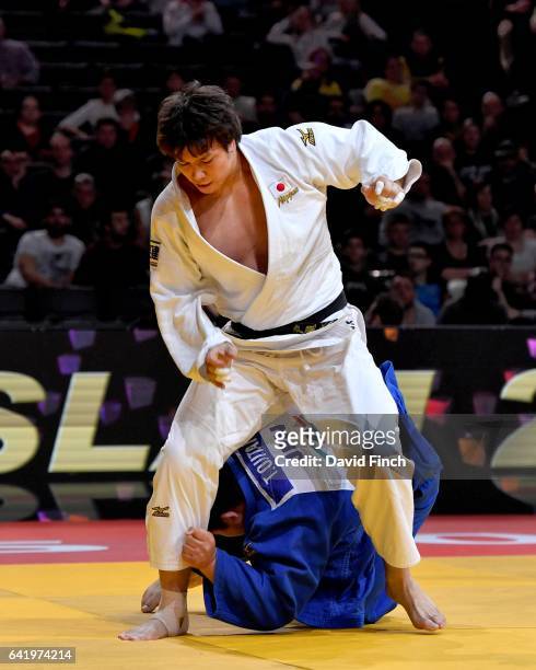 Takeshi Ojitani of Japan attacks his fellow countryman and double world silver medallist, Ryu Shichinohe. Shichinohe was later disqualified for...