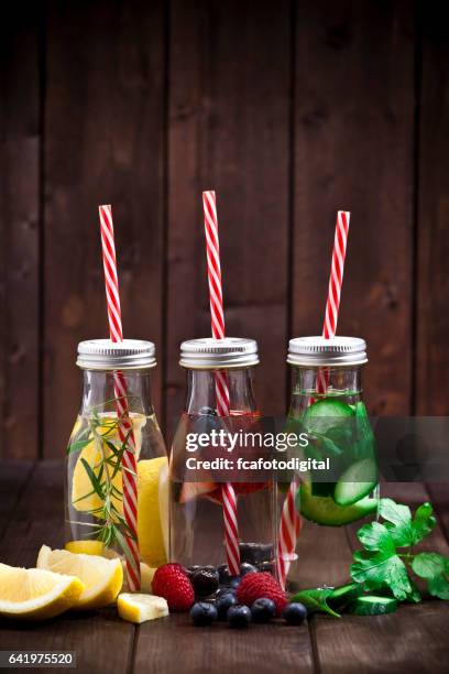 three fruits and vegetables infused water detox drinks - infused water stock pictures, royalty-free photos & images