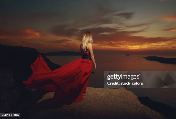 lovely sunset - mysterious blond woman stock pictures, royalty-free photos & images