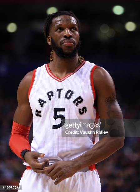 DeMarre Carroll of the Toronto Raptors looks on during the first half of an NBA game against the Detroit Pistons at Air Canada Centre on February 12,...