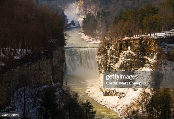 view of middle falls in letchworth state park in winter - rochester new york state stock-fotos und bilder