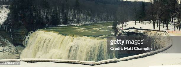 view of middle falls in letchworth state park in winter - rochester new york state stock pictures, royalty-free photos & images