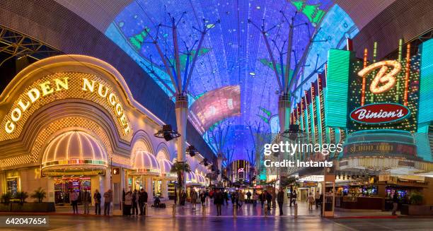 glittering facades the golden nugget and binion’s hotels and casinos of fremont casino in downtown las vegas. - downtown las vegas stock pictures, royalty-free photos & images