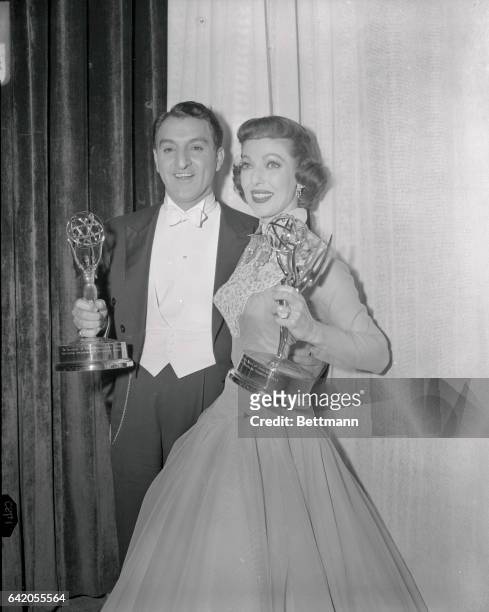 Winning "Emmys.: Hollywood: Danny Thomas and Loretta Young hold their "Emmy" Awards at the Moulin Rouge restaurant in Hollywood after they were...