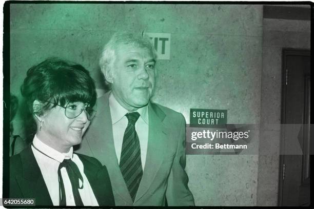 Los Angeles, CA: Michelle Triola Marvin and her attorney, Marvin Mitchelson, leave court after a session of what has been termed the landmark Lee...