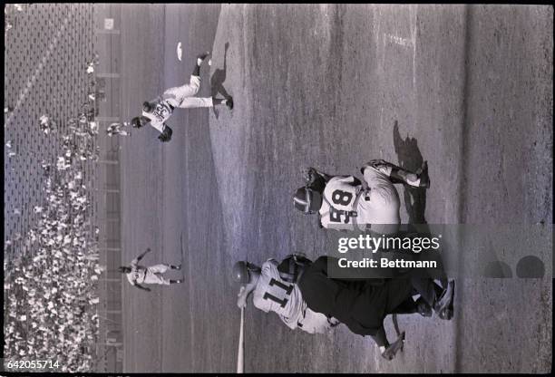 Los Angeles, CA: Los Angeles Dodgers pitcher Sandy Koufax strikes out Cal Neeman of the Chicago Cubs in the first game of a doubleheader here Sept....