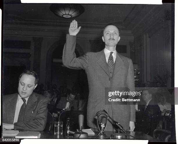 Today's session before the Senate Investigations Subcommittee grew heated when Chairman McCarthy threatened to remove Leonard B. Boudin, left, the...