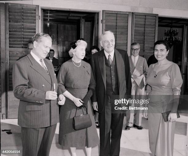 In Yugoslavia for the first time, United States Secretary of State John Foster Dulles, , is welcomed with a smile by President Josip Broz of...