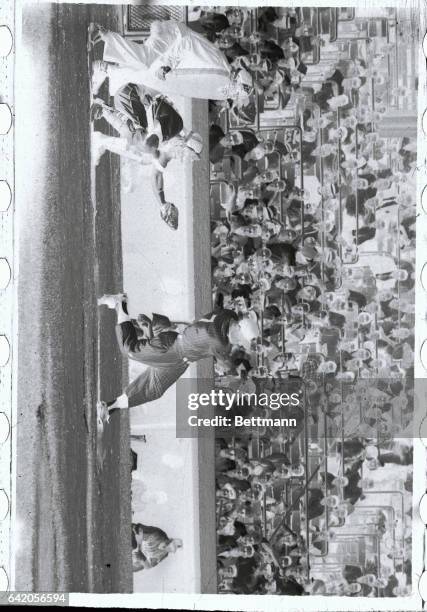 Yankee's Mickey Mantle connects for his 46th home run of the season off athletic's hurler Jack McMahan during the third inning of the Kansas City,...