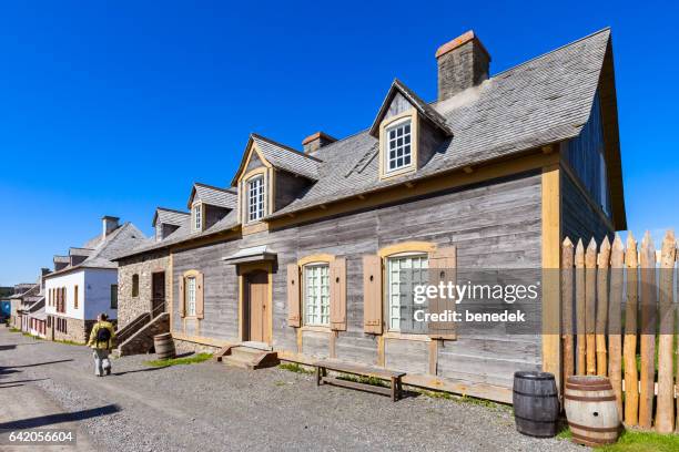 tourist visits fortress of louisbourg nova scotia canada - national landmark stock pictures, royalty-free photos & images