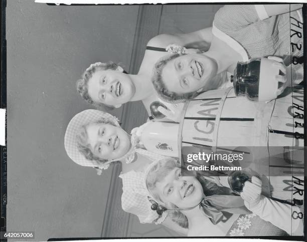 New York: By Their "Crowns" You Shall Know Them-- Four Michigan Misses chosen to represent their state during Michigan week, , pose at the hotel...